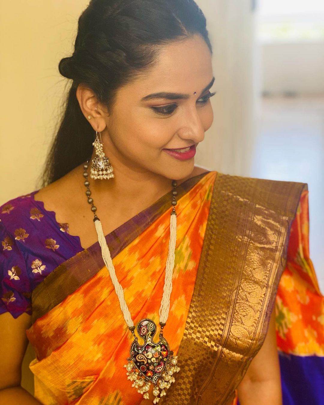 Telugu Tv Anchor Kasi Annapurna Stills in Orange Saree